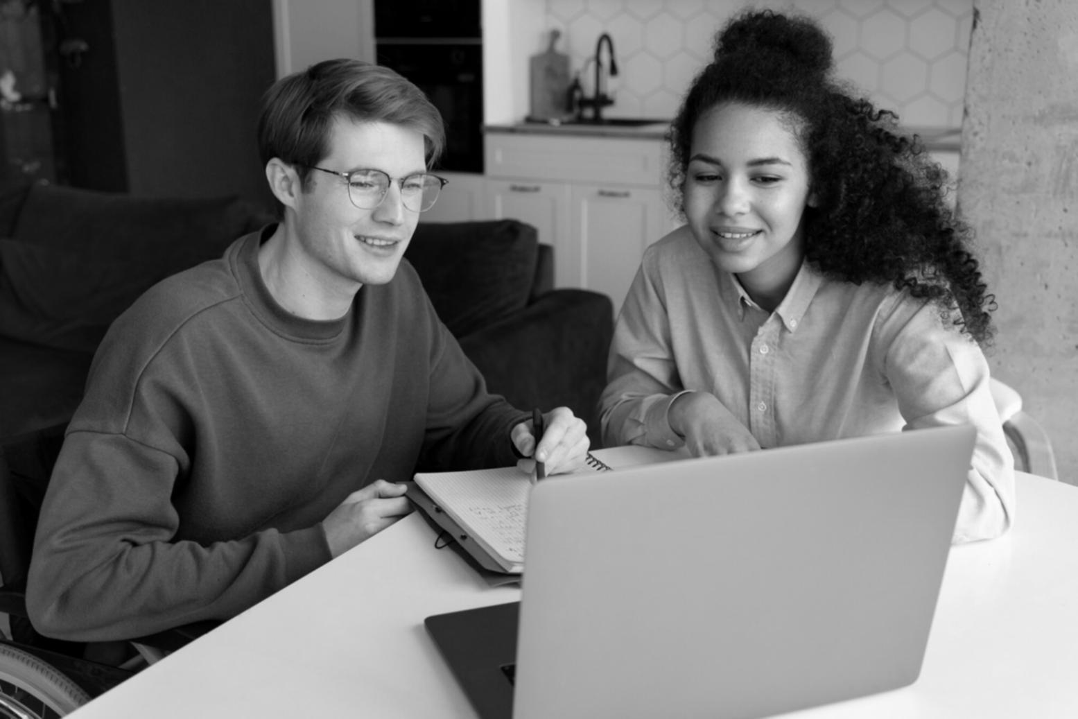 Community workshop session showing people collaborating on budgeting exercises